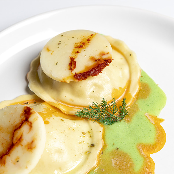 Product - Ravioli di gamberi con zucchine, cipolle bionde e Fiore Dolce Piccante.